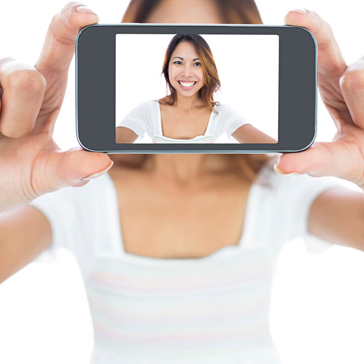 Biometric authentication by selfie