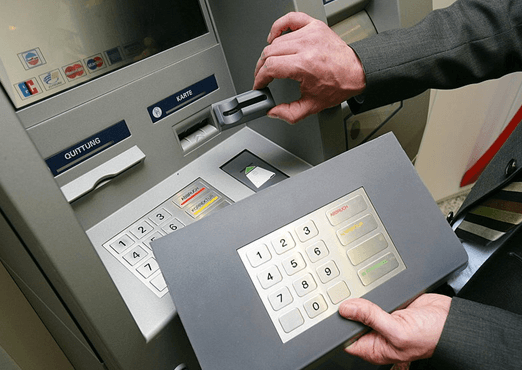 Credit card fraud with an overlay on the keypad