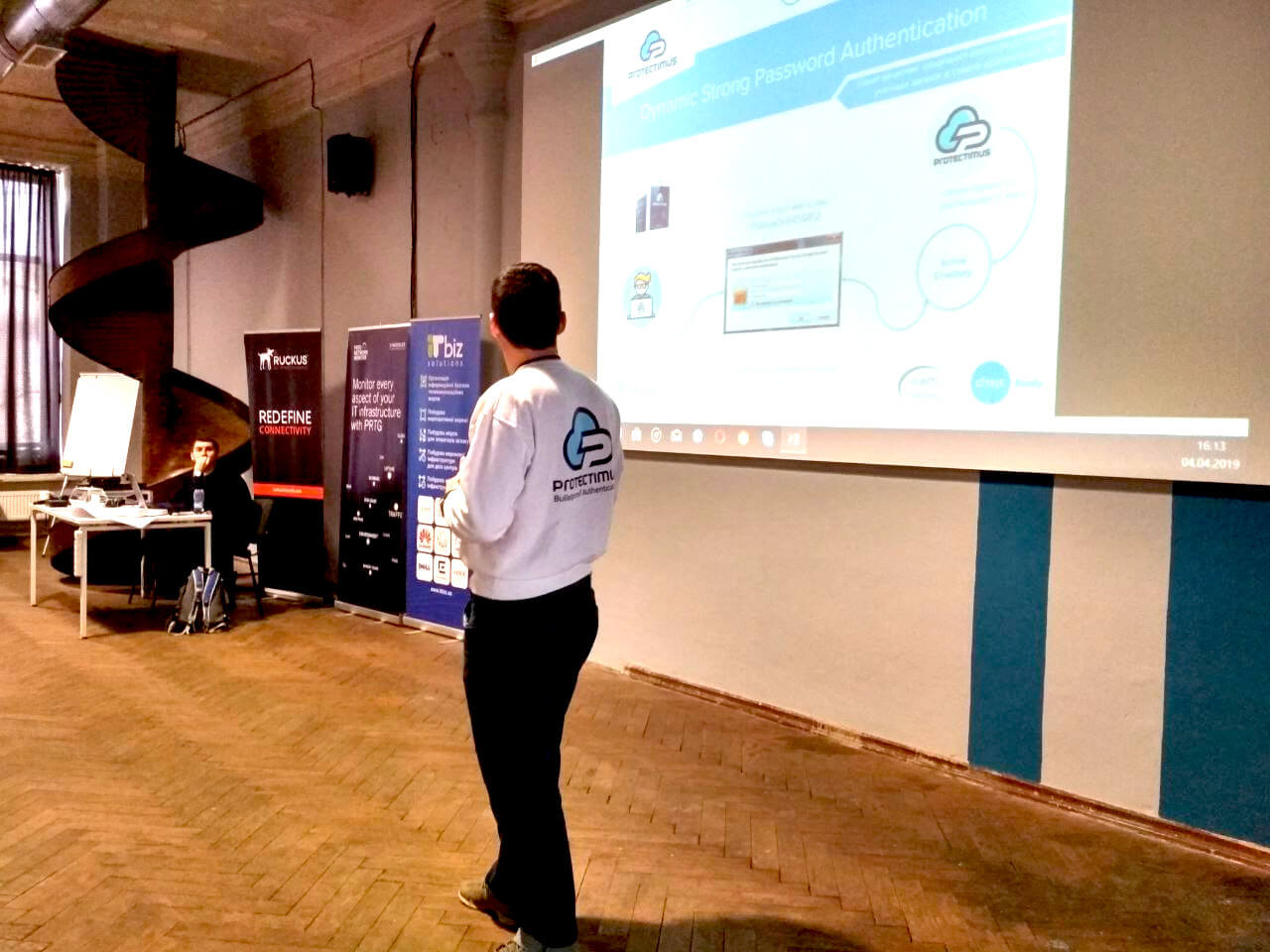 Protectimus team presenting on the conference